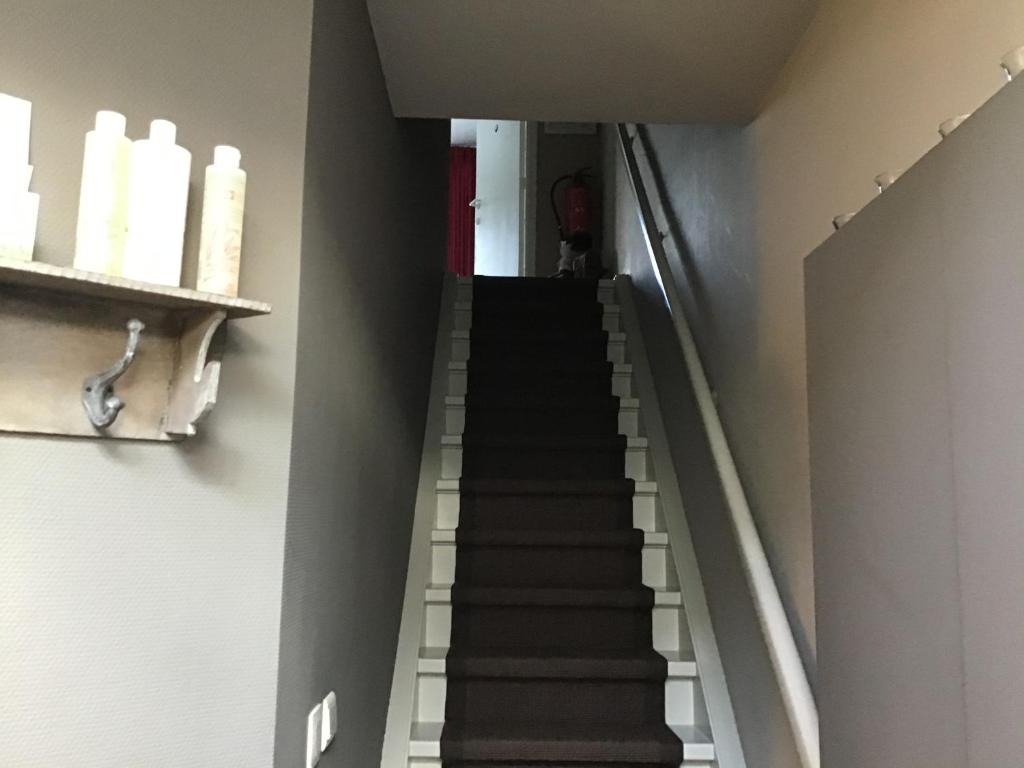 Fotografie z fotogalerie ubytování Guesthouse De Steenberg tweepersoonskamer met grote badkamer, kitchenette en tuinzicht op de eerste verdieping v destinaci Geel