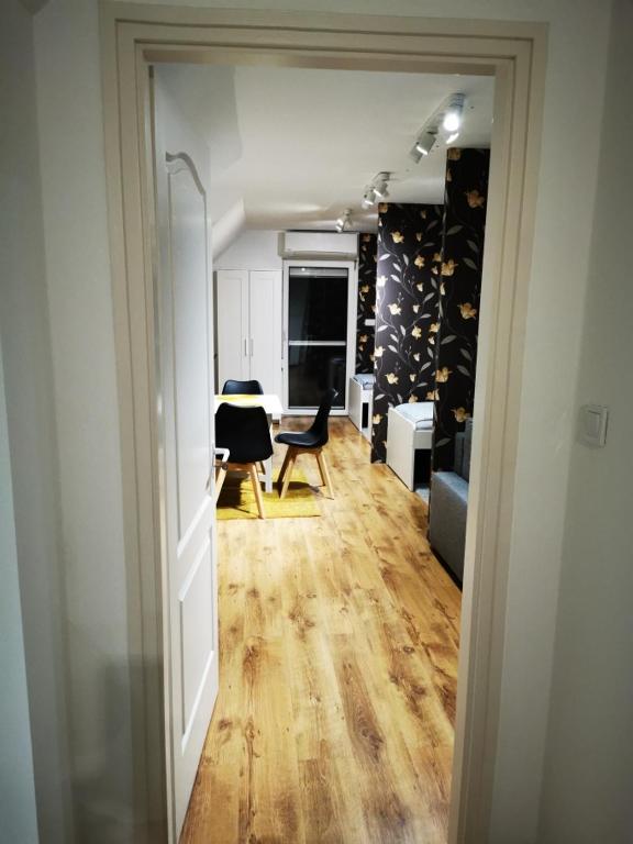 Televízia a/alebo spoločenská miestnosť v ubytovaní Pintes 38 A