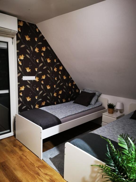 Posteľ alebo postele v izbe v ubytovaní Pintes 38 A