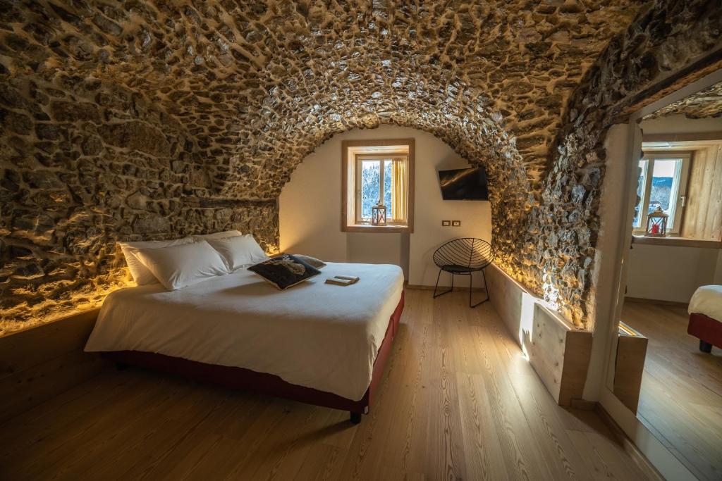 Postel nebo postele na pokoji v ubytování Bazzario B&B