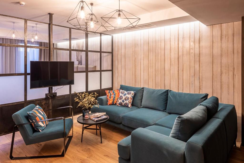 TV a/nebo společenská místnost v ubytování Loft7