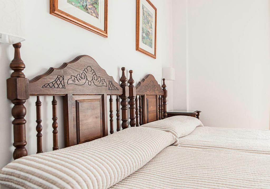 Postel nebo postele na pokoji v ubytování Hostal Marissal by Dorobe