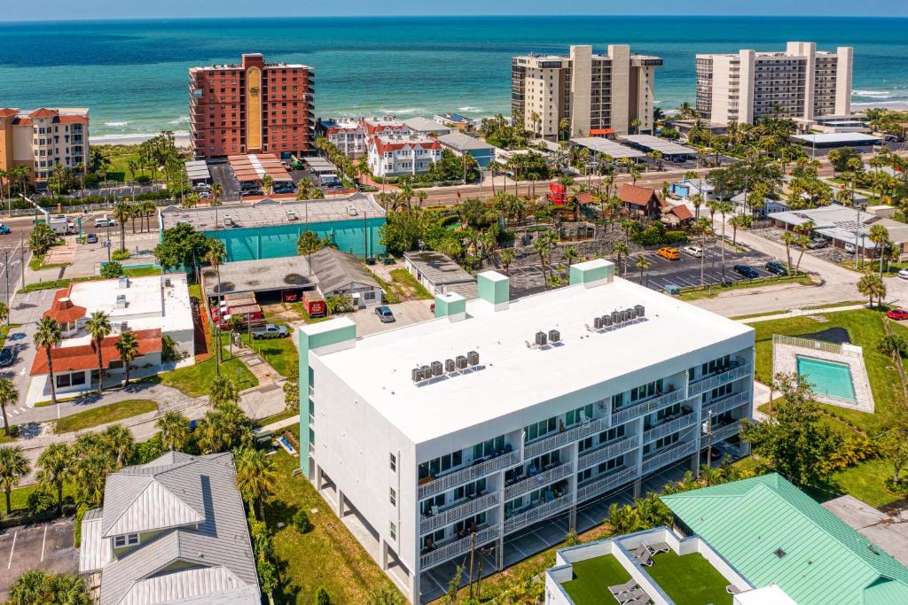 an aerial view of a city with the ocean at Madeira Beach Condos in St Pete Beach