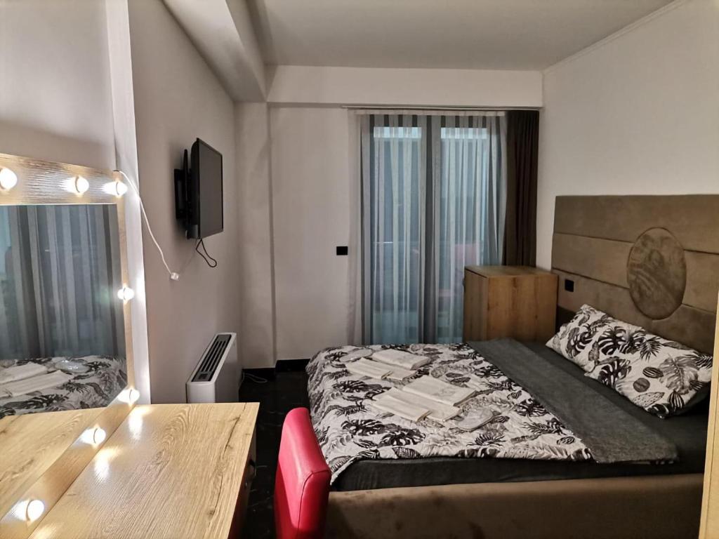 Postel nebo postele na pokoji v ubytování HOTEL EMA