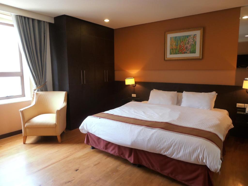 Postel nebo postele na pokoji v ubytování Ciudad Fernandina Hotel