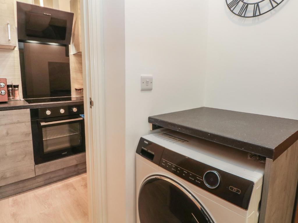 Kuchyň nebo kuchyňský kout v ubytování Apartment 24