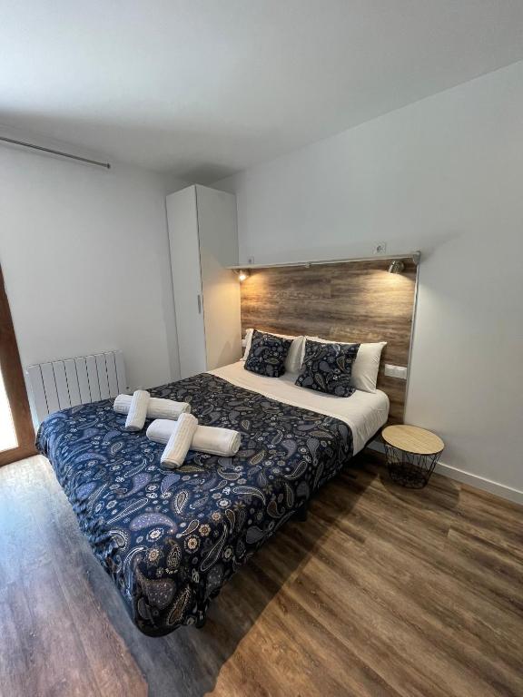 Postel nebo postele na pokoji v ubytování Aparthotel Sant Andreu