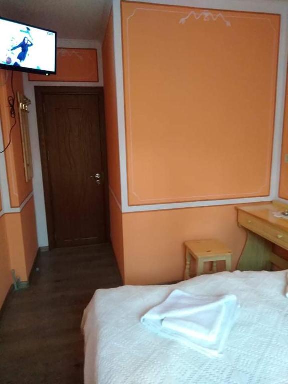Postel nebo postele na pokoji v ubytování Тороманова къща