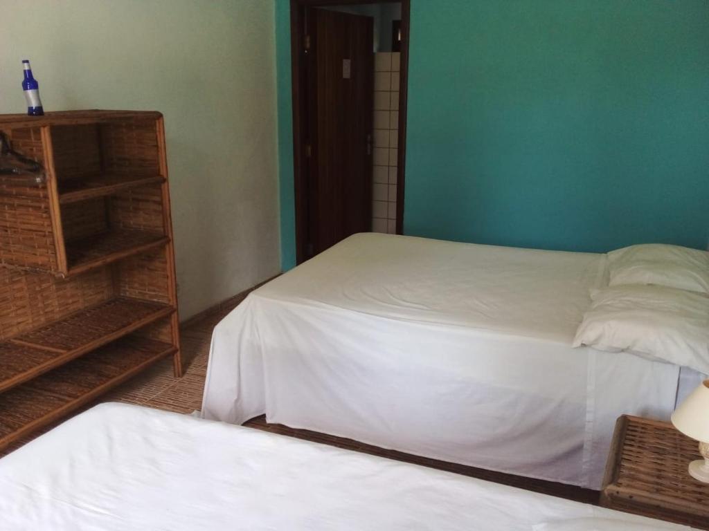 Posteľ alebo postele v izbe v ubytovaní Pousada Marlin Azul