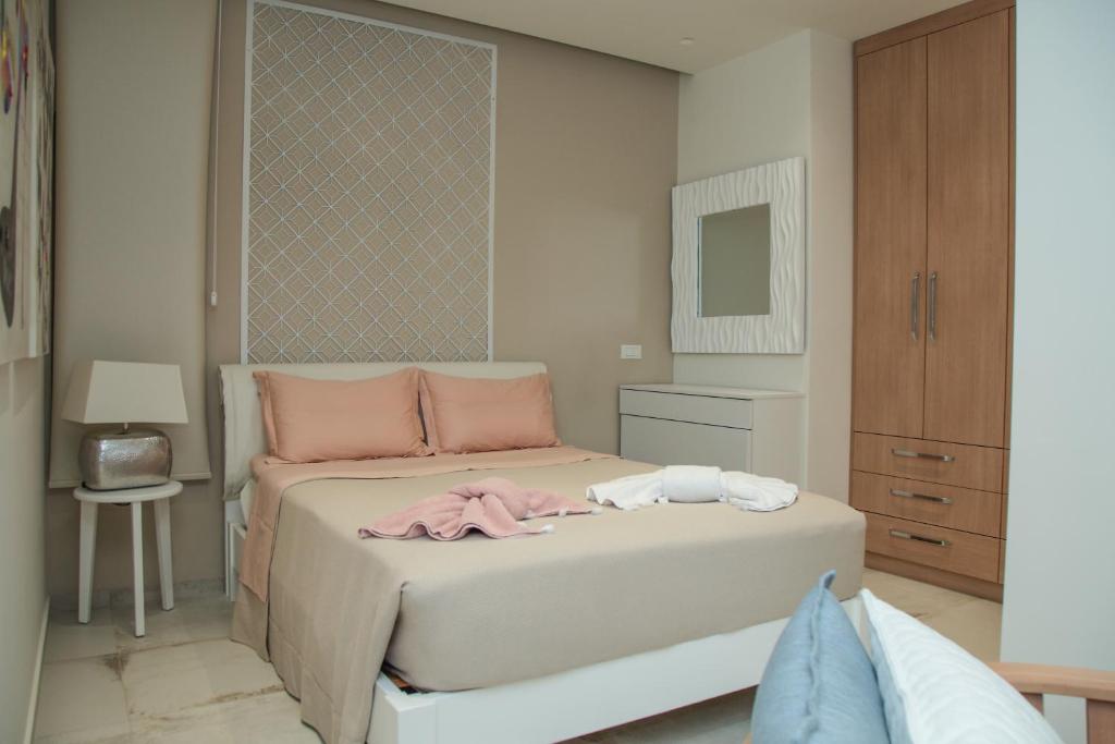 Postel nebo postele na pokoji v ubytování Almyra Seaside House Mochlos
