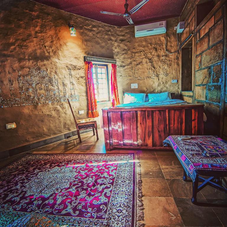 Postel nebo postele na pokoji v ubytování Mud Mirror Guesthouse
