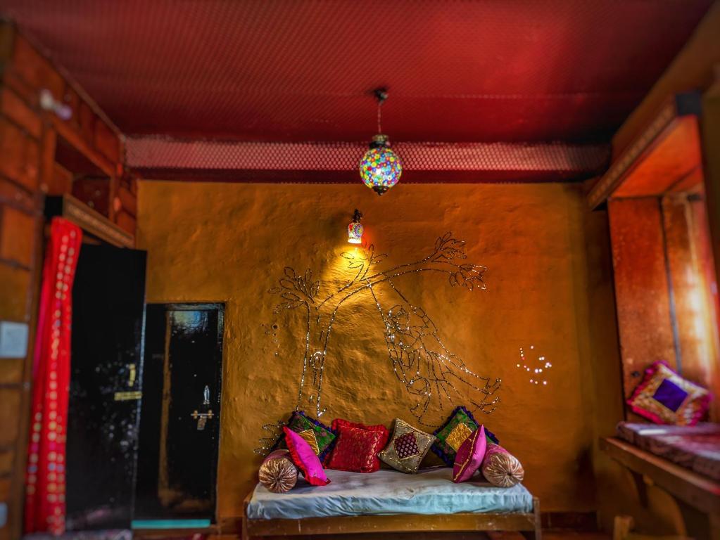 Postel nebo postele na pokoji v ubytování Mud Mirror Guesthouse