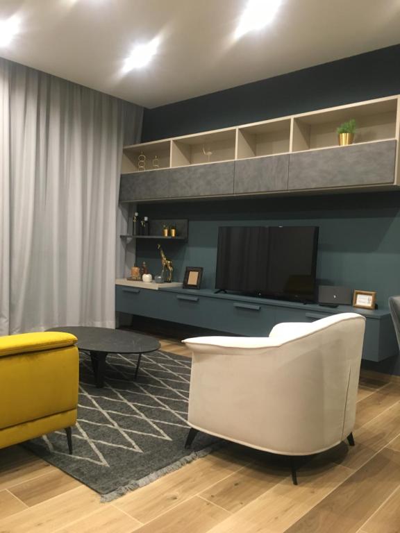 TV a/nebo společenská místnost v ubytování Royal Suite