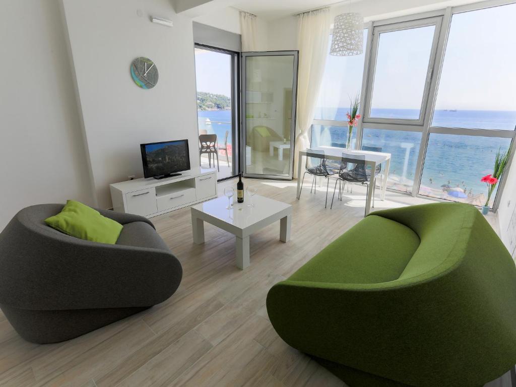 TV a/nebo společenská místnost v ubytování Apart Hotel Sea Fort