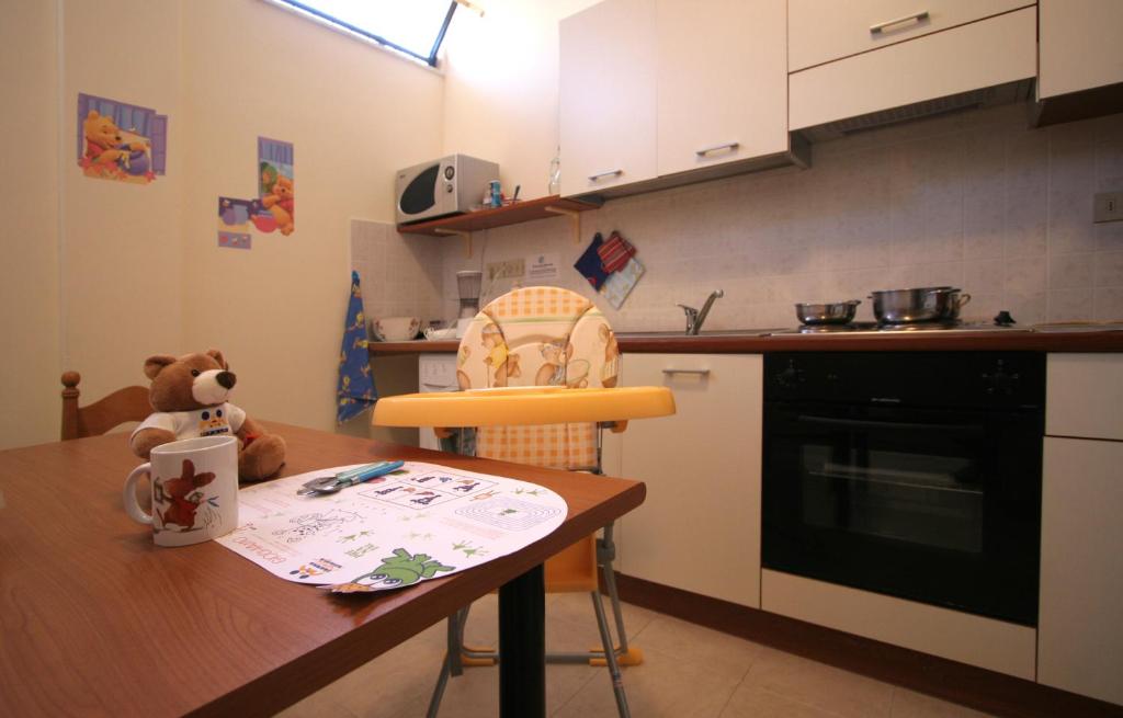 Kuchyňa alebo kuchynka v ubytovaní Hotel Casella