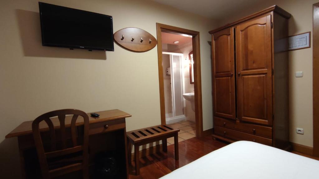 Postel nebo postele na pokoji v ubytování Ostatu Zegama