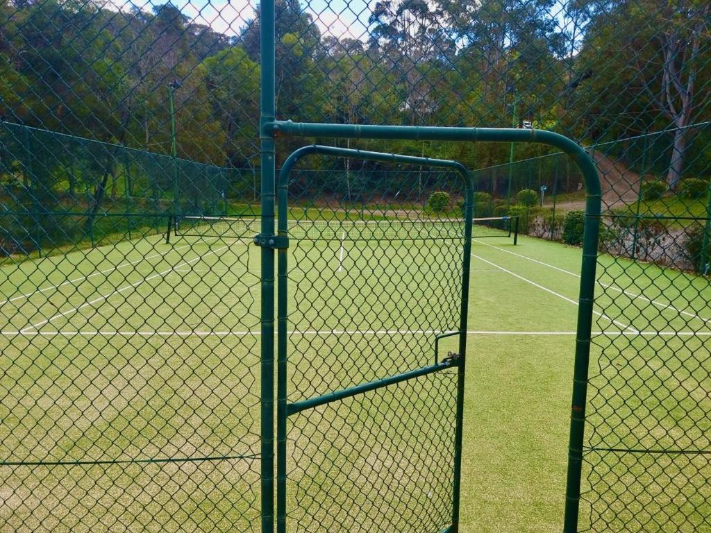 Tenis a/nebo squash v ubytování Blokhus, a stunning retreat in the treetops nebo okolí