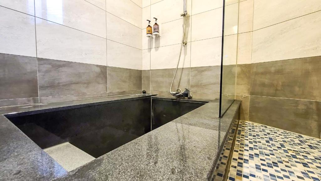 Koupelna v ubytování WanTon B&B