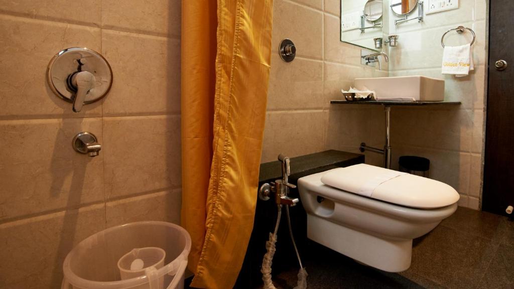 Koupelna v ubytování HOTEL SAI NISARG