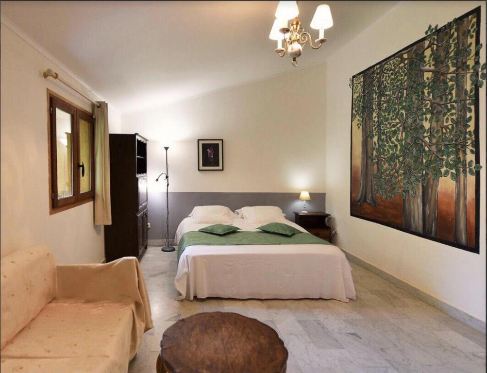 Postel nebo postele na pokoji v ubytování Hotel Monte d'Oro