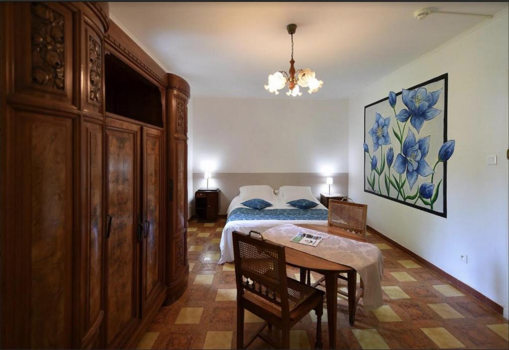 Postel nebo postele na pokoji v ubytování Hotel Monte d'Oro