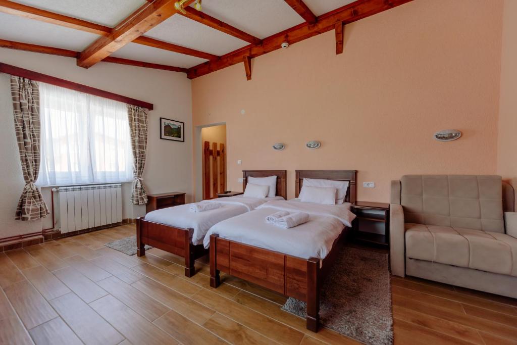 Letto o letti in una camera di Hotel Zlatni bor