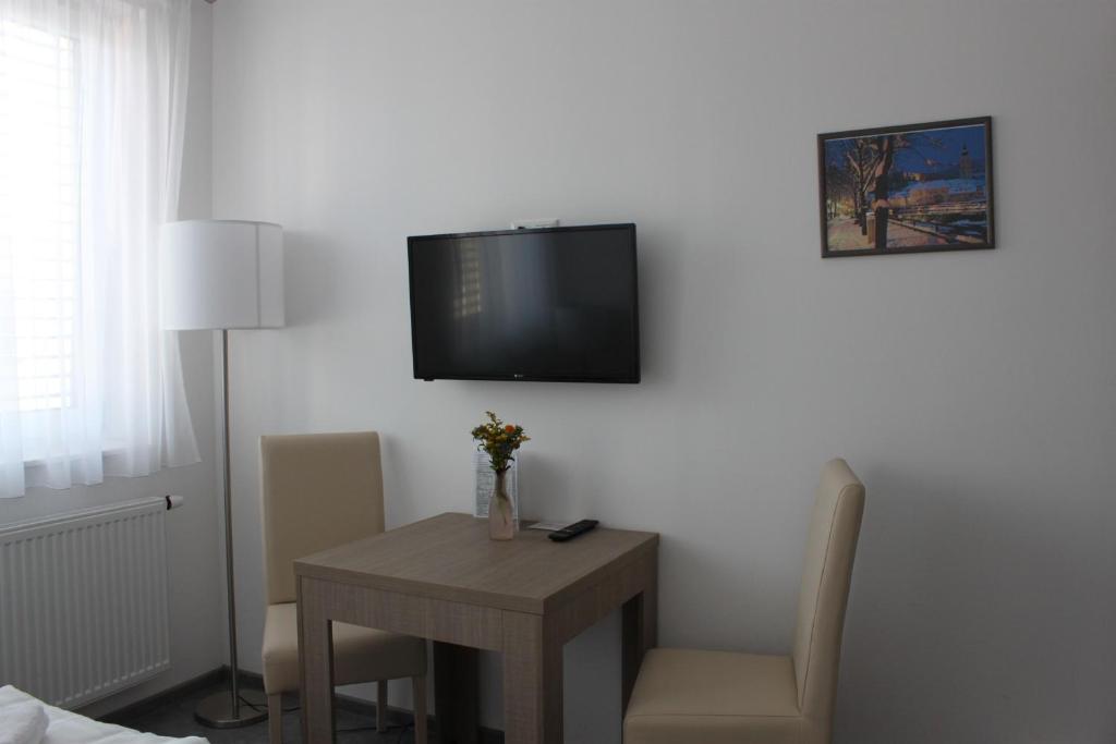 TV a/nebo společenská místnost v ubytování AIS Center