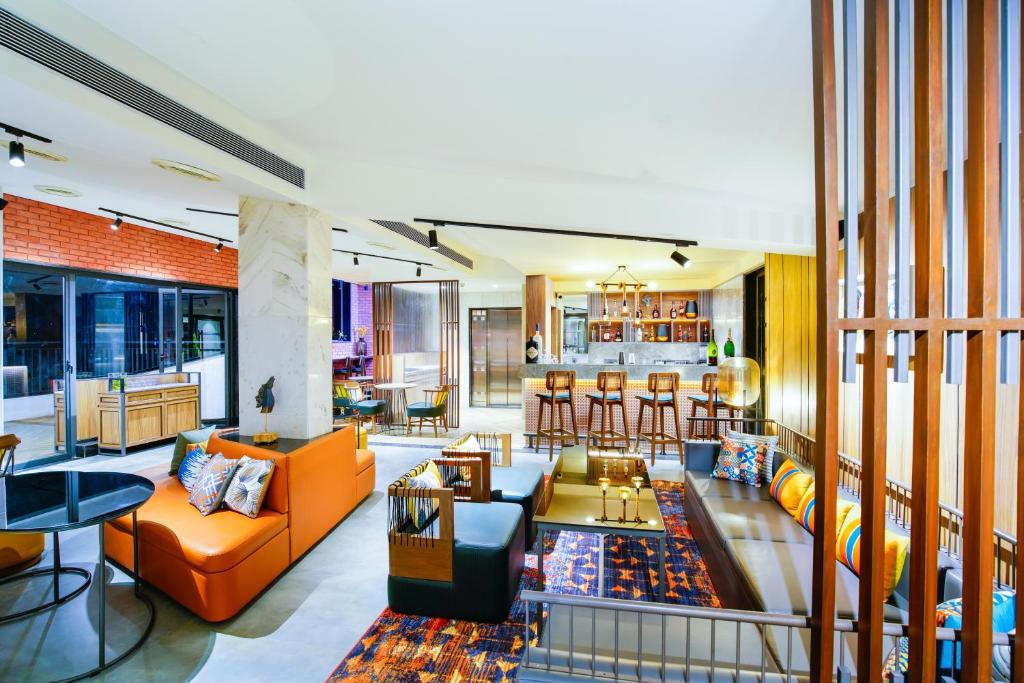 Posezení v ubytování Amoravida By 7 Apple Resorts, Goa