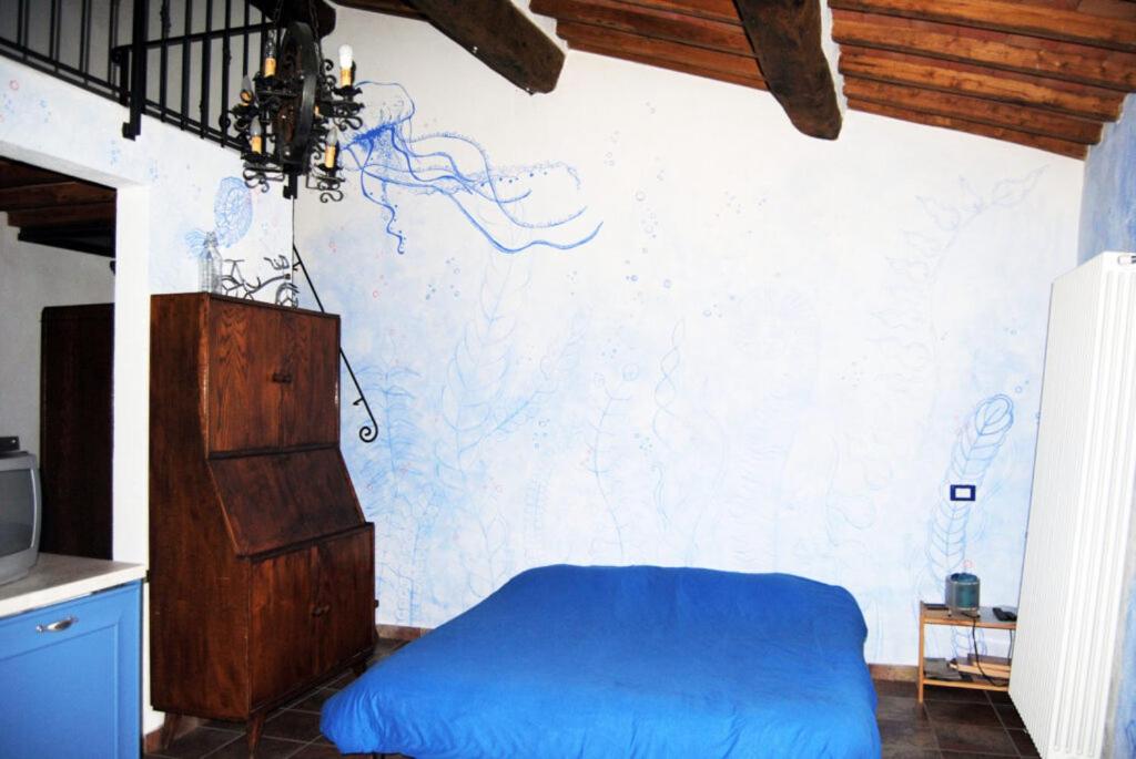 Posteľ alebo postele v izbe v ubytovaní B&B al Pozzolone