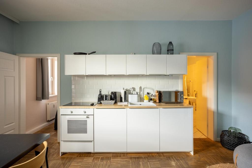 Kuchyň nebo kuchyňský kout v ubytování limehome Dresden Hoyerswerdaerstraße
