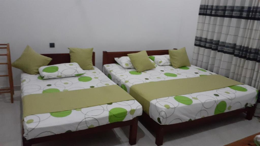 Postel nebo postele na pokoji v ubytování Ever Green Villa