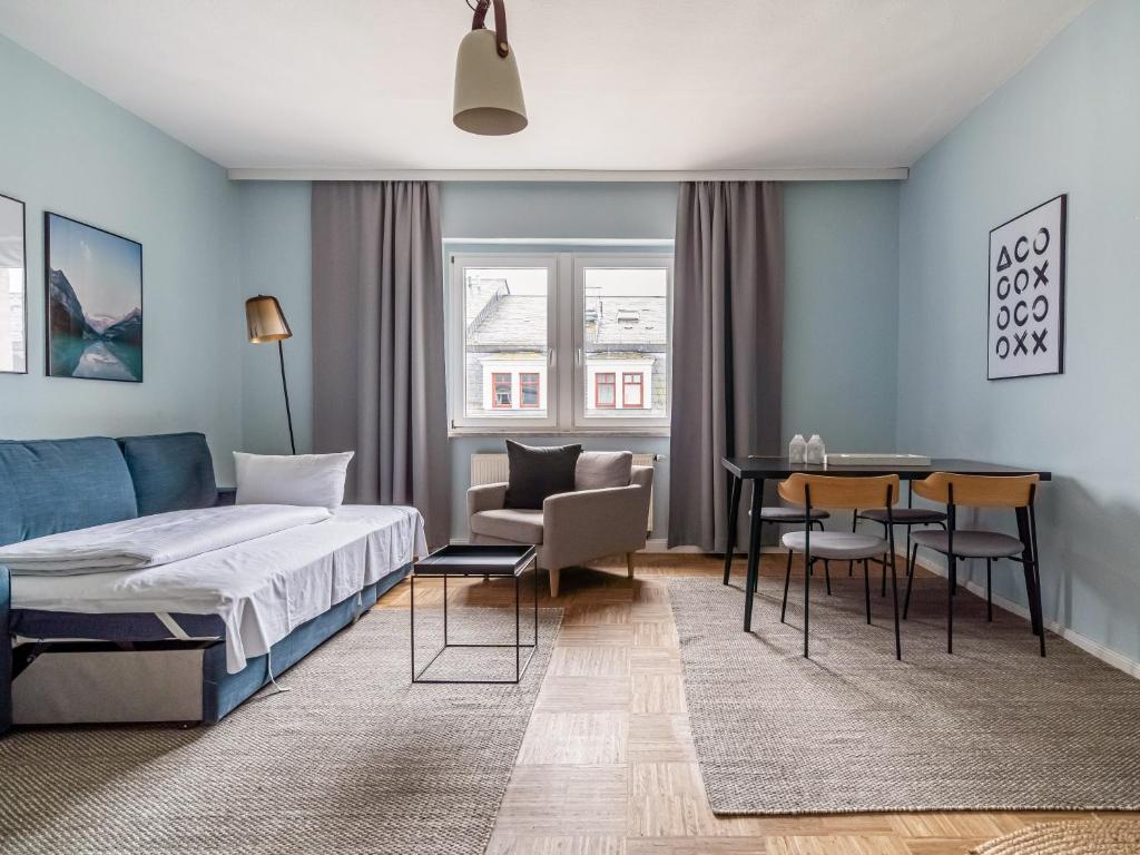Postel nebo postele na pokoji v ubytování limehome Dresden Hoyerswerdaerstraße