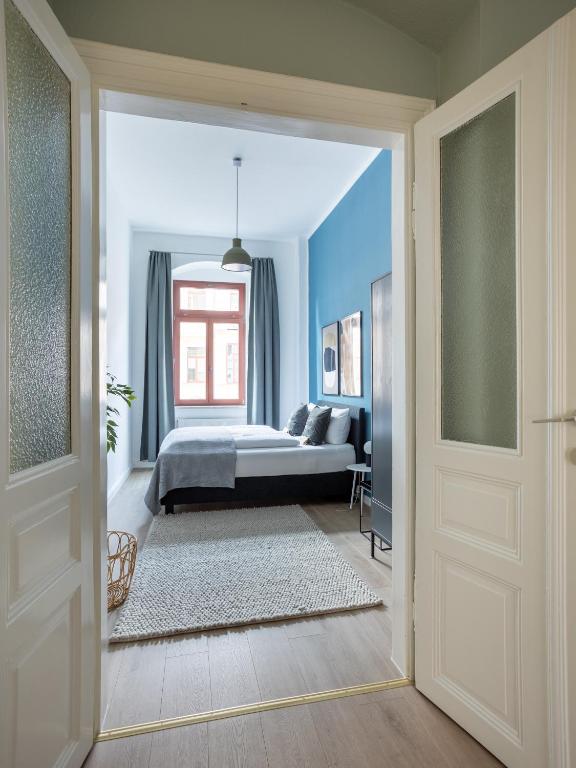 Postel nebo postele na pokoji v ubytování limehome Dresden Hoyerswerdaerstraße