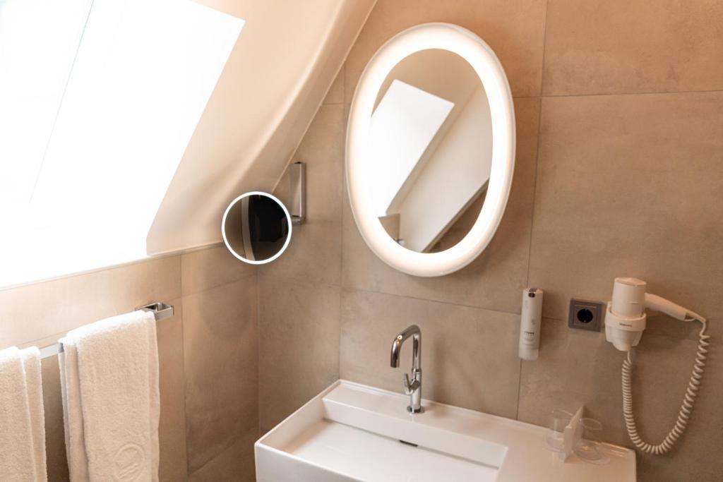 Koupelna v ubytování Stadthotel Styria