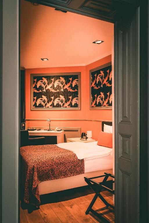 Postel nebo postele na pokoji v ubytování Hotel Villa Klemm - Wiesbaden City