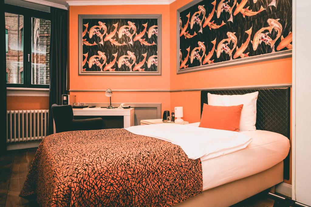 Postel nebo postele na pokoji v ubytování Hotel Villa Klemm - Wiesbaden City