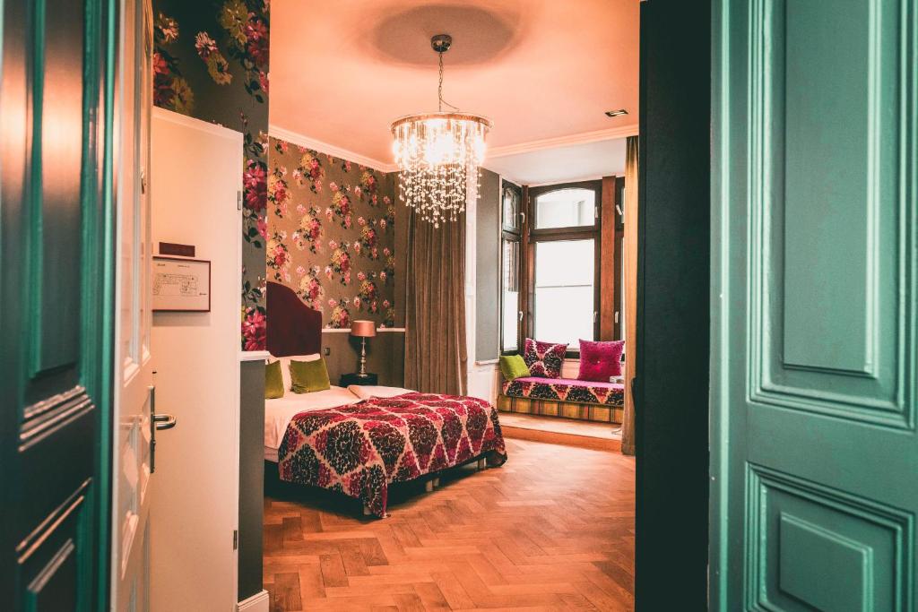 Postel nebo postele na pokoji v ubytování Hotel Villa Klemm - Wiesbaden City