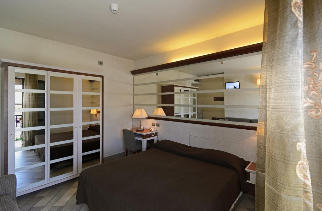 Kuchyň nebo kuchyňský kout v ubytování Hotel Eden