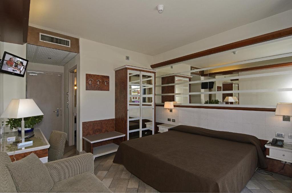 Postel nebo postele na pokoji v ubytování Hotel Eden