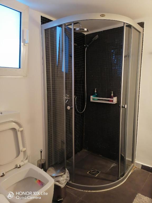 A bathroom at Myron Apartments