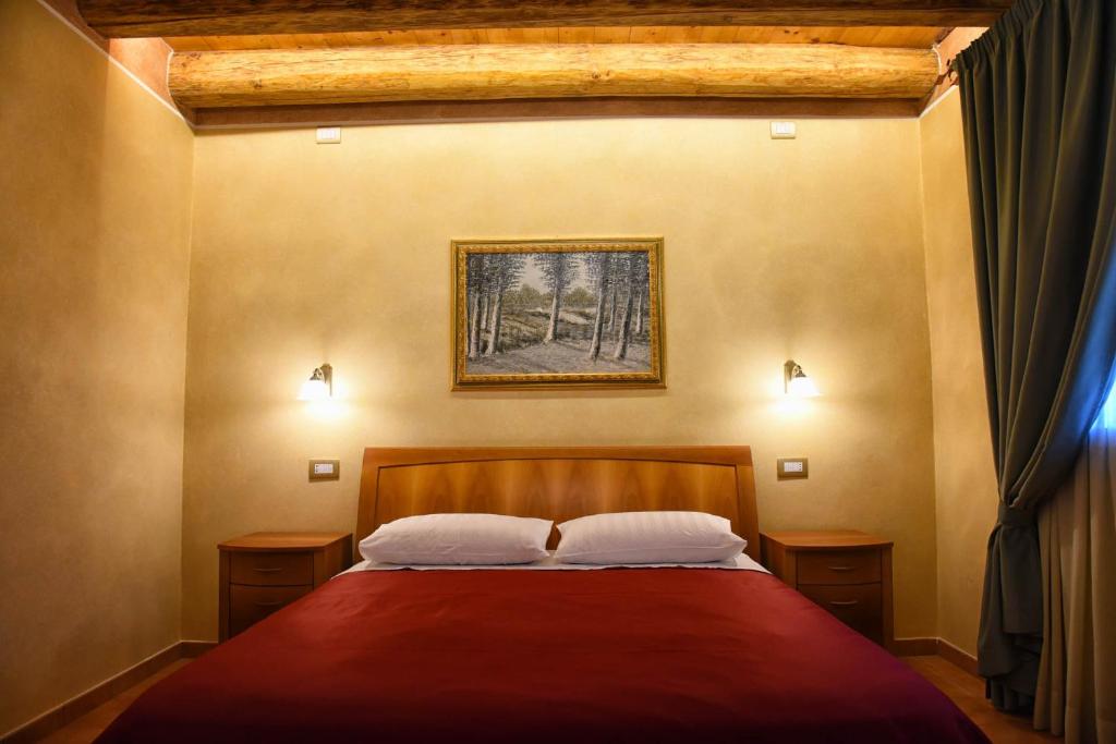Letto o letti in una camera di Agriturismo Corte Benetti