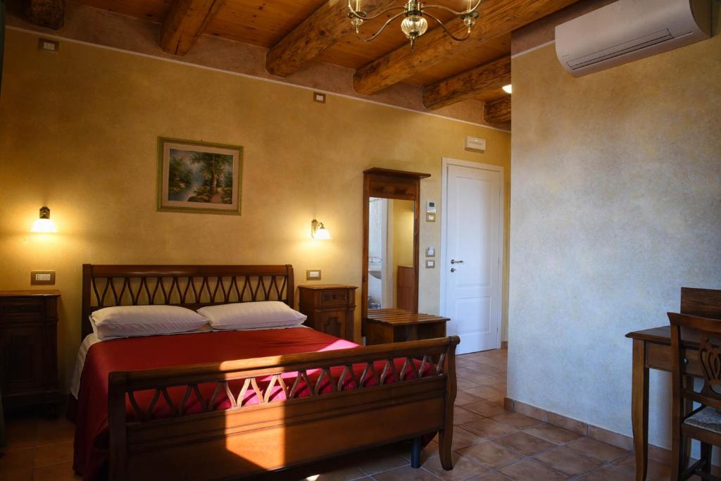 Letto o letti in una camera di Agriturismo Corte Benetti
