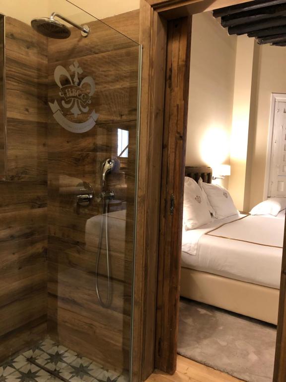 Postel nebo postele na pokoji v ubytování Hotel Boutique Casa del Comendador
