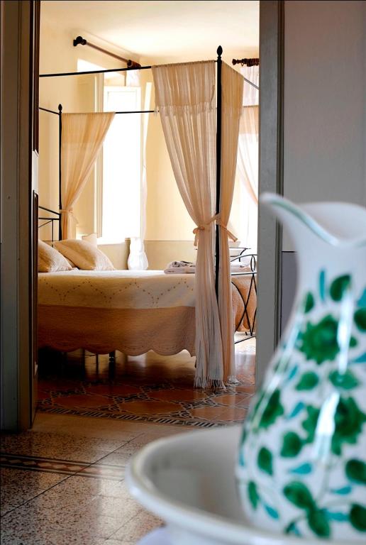 Łóżko lub łóżka w pokoju w obiekcie Bed and Breakfast Evelina
