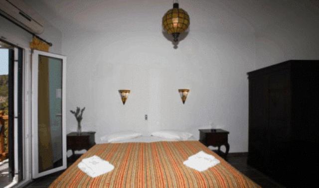 A bed or beds in a room at To Ktima tis Matinas