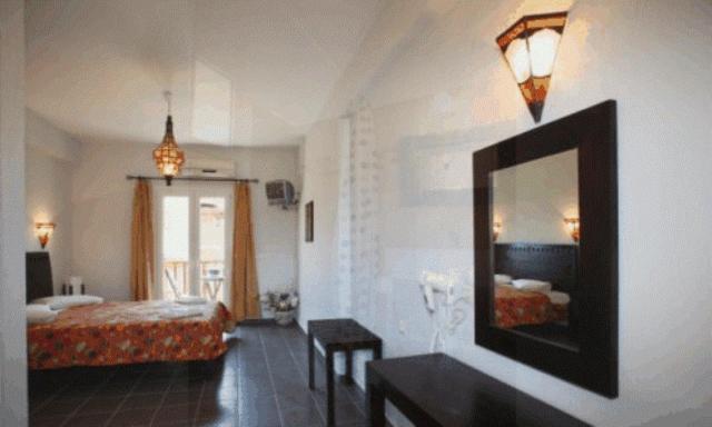 A bed or beds in a room at To Ktima tis Matinas