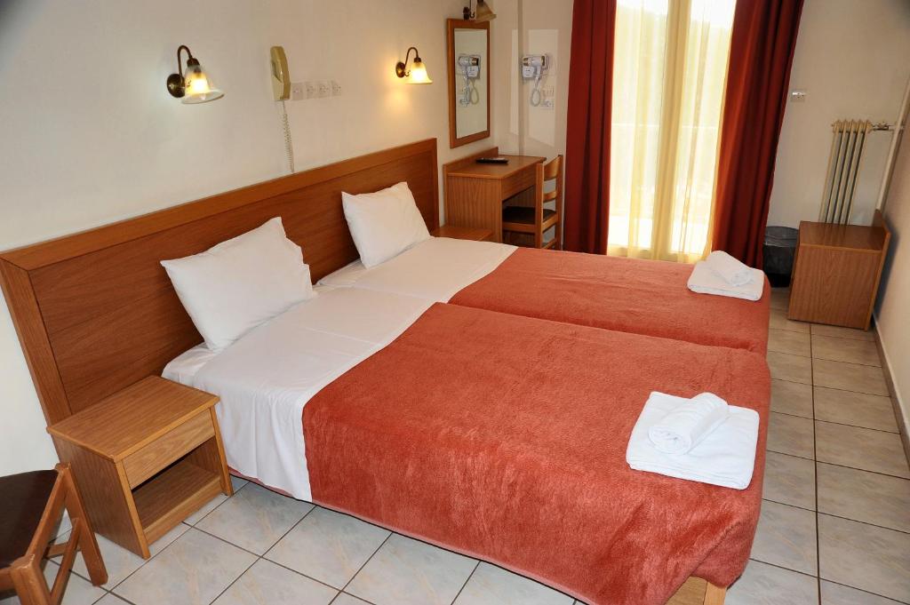 Postel nebo postele na pokoji v ubytování Castri Hotel