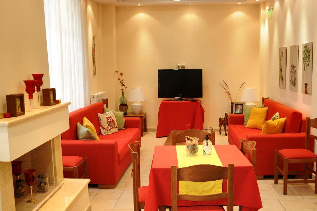 TV a/nebo společenská místnost v ubytování Castri Hotel