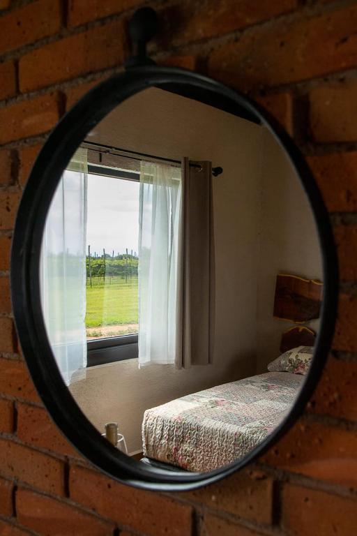 Postel nebo postele na pokoji v ubytování Hotel Viñedo los Arcángeles