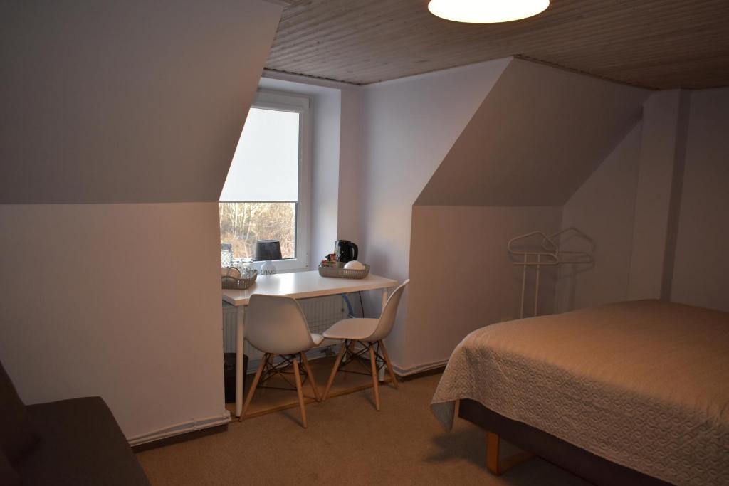 Postel nebo postele na pokoji v ubytování Guest House Gero Vėjo Namai